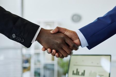 close-up-two-business-people-shaking-hands-after-successful-partnership-negotiation-office_236854-41_1